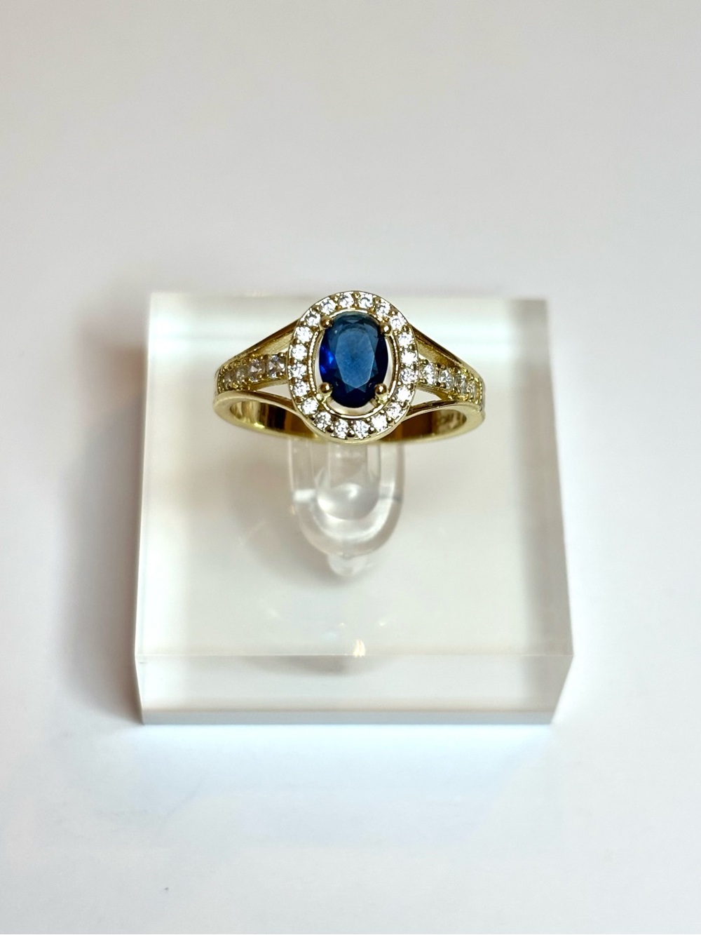 Gold ring with blue stone
